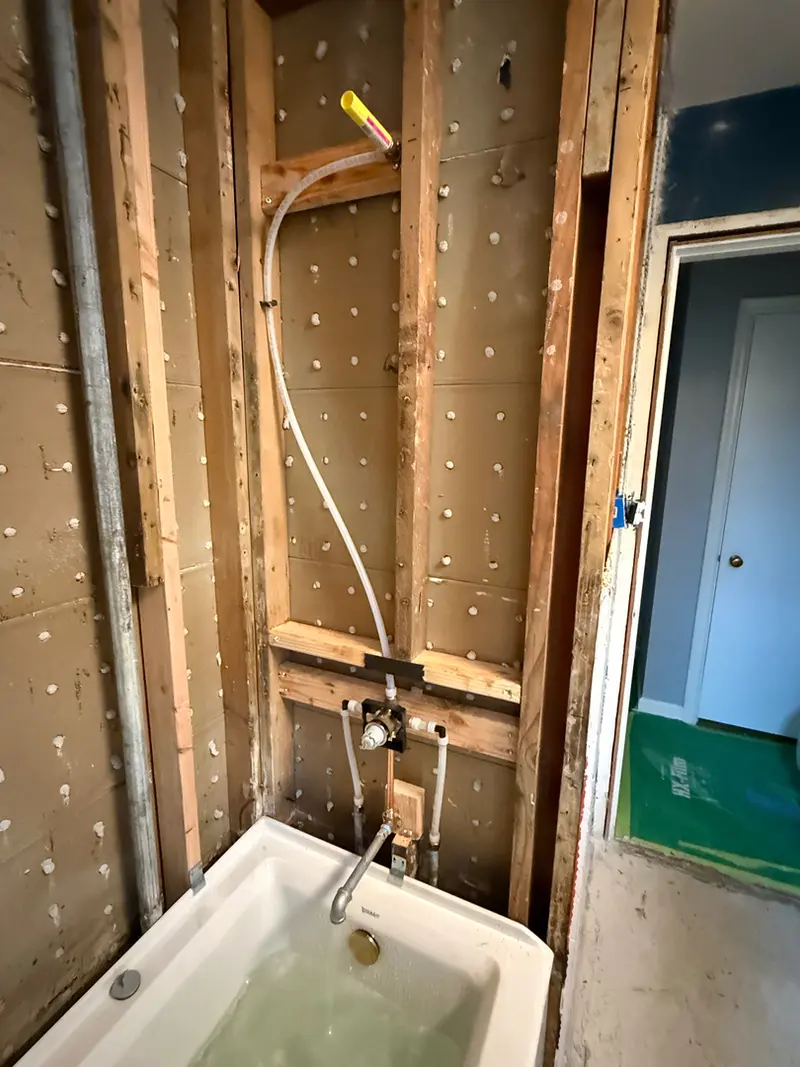Shower valve rough-in for bathtub during full bathroom renovation in Sandy, Oregon, shower plumbing and remodel by Bigfoot Plumbing