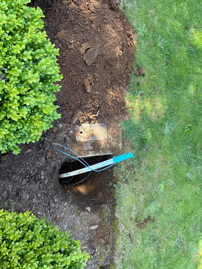 Water meter and service line excavation in Sandy, Oregon, main water line replacement by Bigfoot Plumbing licensed plumber